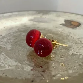 Earrings with dark red pastel Murano glass sphere studs on 24ct gold plated posts